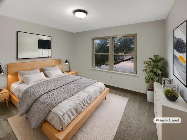 bedroom featuring baseboards