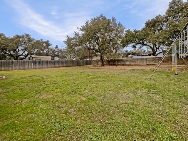 view of yard featuring a fenced backyard