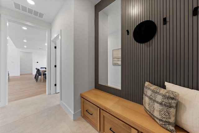 mudroom with baseboards, visible vents, and recessed lighting