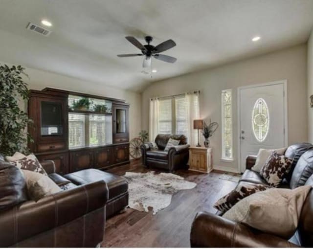 living room featuring visible vents, a ceiling fan, wood finished floors, vaulted ceiling, and recessed lighting
