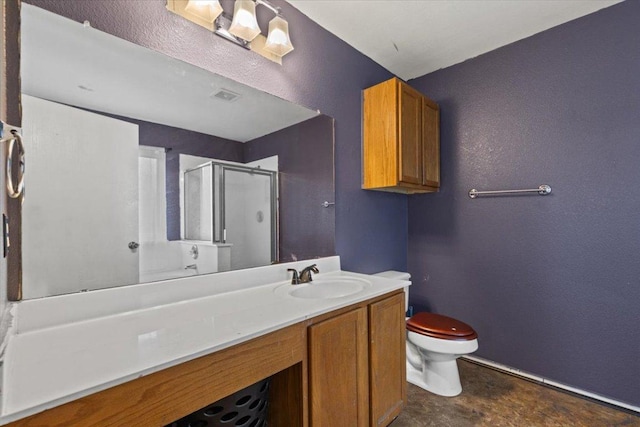 full bathroom featuring visible vents, a textured wall, toilet, vanity, and a shower stall