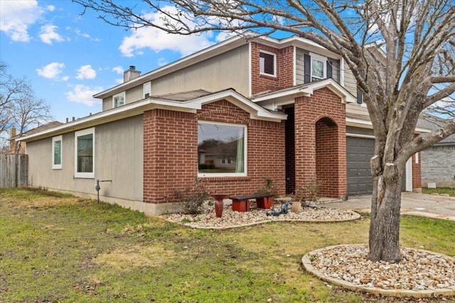 traditional-style home with driveway, a chimney, a front lawn, and brick siding