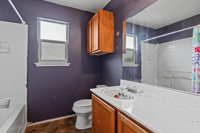 full bathroom featuring shower / bath combo, vanity, and toilet