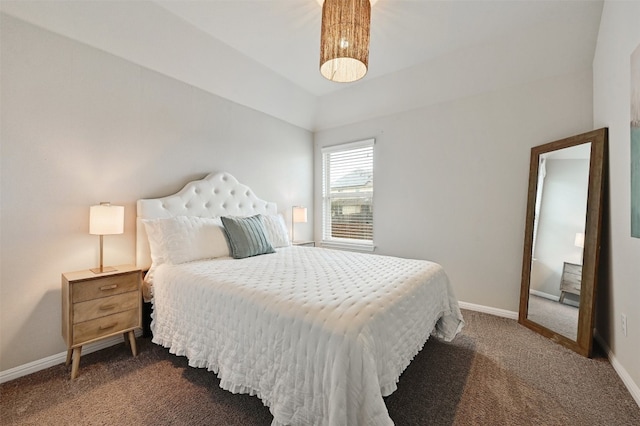 carpeted bedroom with baseboards