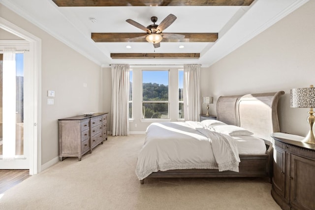 bedroom featuring light carpet, a ceiling fan, beam ceiling, and baseboards