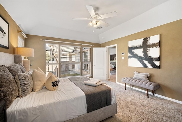 carpeted bedroom with vaulted ceiling, baseboards, visible vents, and ceiling fan