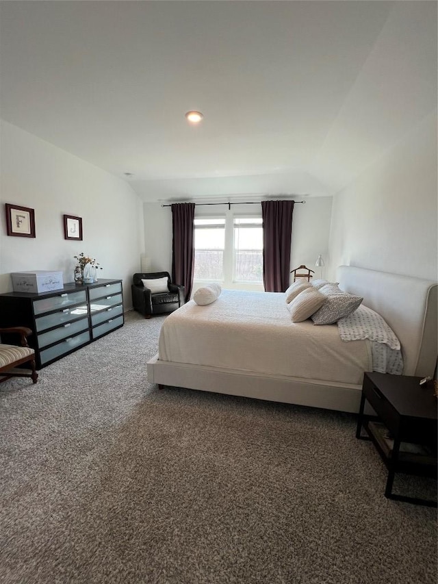 carpeted bedroom with recessed lighting