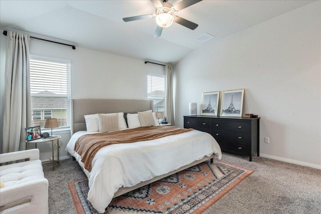 bedroom with light carpet, baseboards, visible vents, and vaulted ceiling