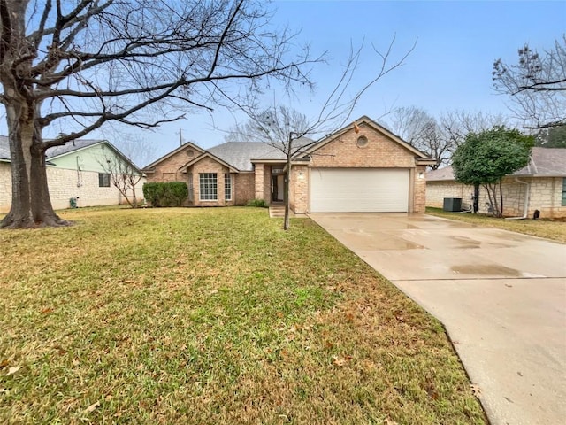 ranch-style home with concrete driveway, brick siding, an attached garage, and a front lawn