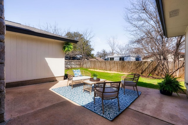 view of patio / terrace with a fenced backyard and an outdoor hangout area