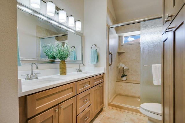 bathroom featuring a sink and a shower stall