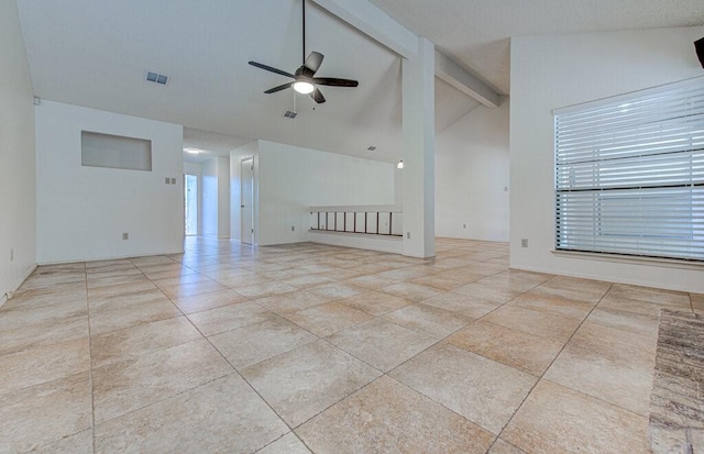 tiled empty room with high vaulted ceiling, ceiling fan, visible vents, and beamed ceiling