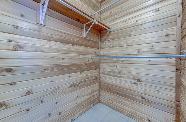 spacious closet featuring tile patterned floors