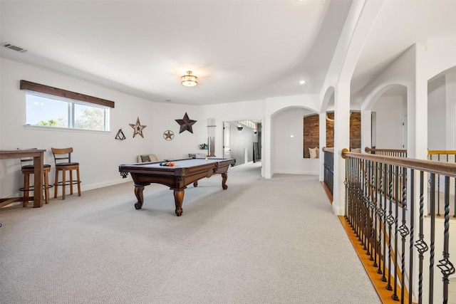 205 Agave Bloom Cv, Austin, TX 78738 - recreation room with pool table, arched walkways, light carpet, and baseboards
