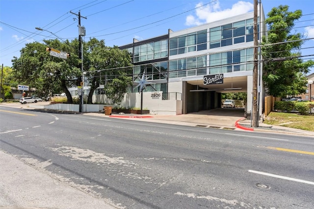 view of property featuring a carport