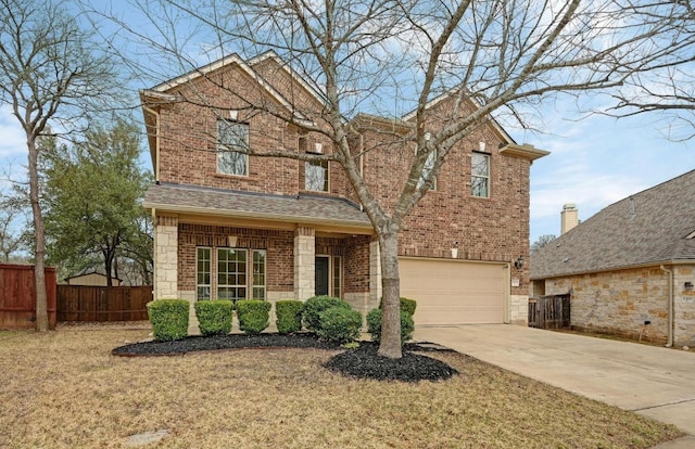 view of front of home featuring brick siding, roof with shingles, concrete driveway, fence, and a garage