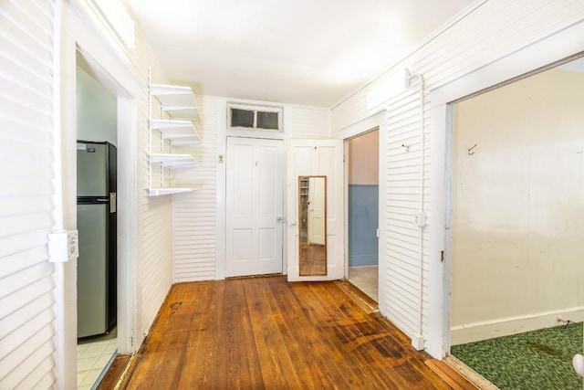 hall featuring wood-type flooring