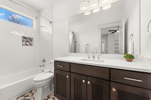 full bathroom with shower / bathtub combination, vanity, and toilet