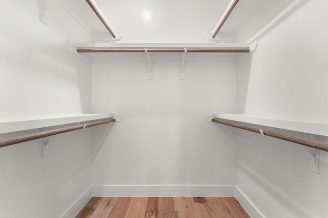 walk in closet featuring light wood-style floors