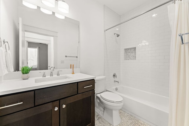 bathroom with shower / bath combo, vanity, and toilet