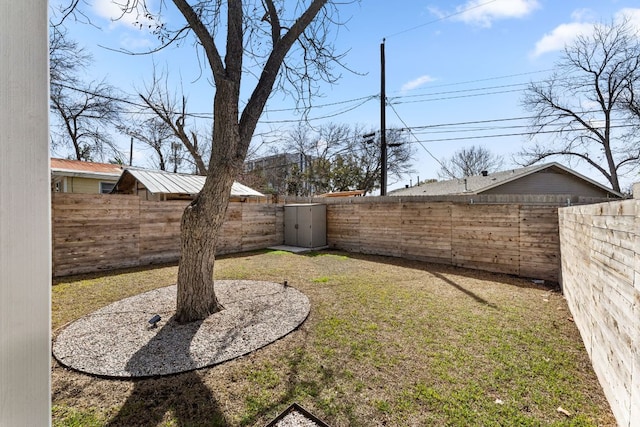 view of yard with a fenced backyard