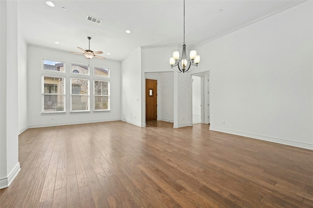 unfurnished living room with crown molding, visible vents, wood finished floors, and ceiling fan with notable chandelier