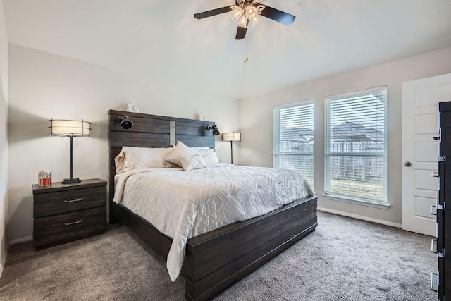 bedroom with carpet, baseboards, and ceiling fan