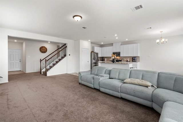 living area with stairway, carpet, visible vents, and recessed lighting