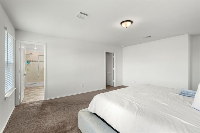 bedroom featuring carpet flooring, visible vents, and baseboards