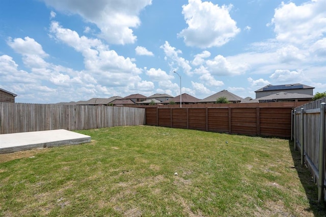 view of yard featuring a fenced backyard