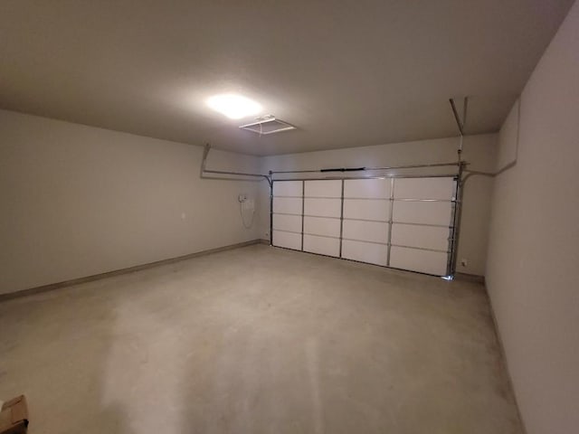 garage with baseboards