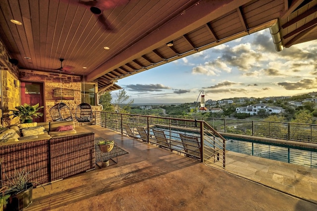 exterior space featuring a ceiling fan and an outdoor hangout area