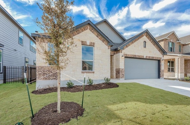 view of front of house featuring a garage, a front yard, concrete driveway, and fence