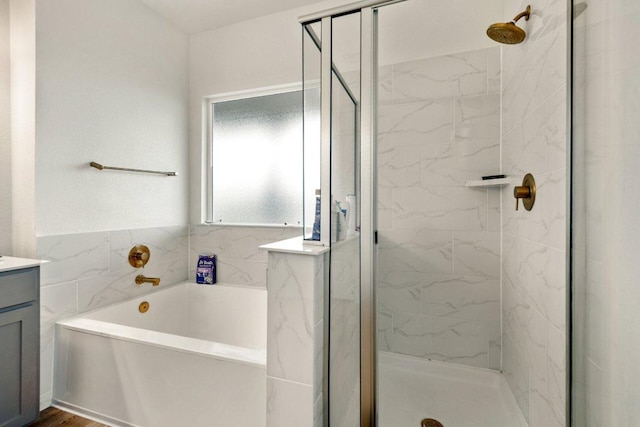 4805 Cressal Dr, Pflugerville, TX 78653 - bathroom featuring a bath, a marble finish shower, and vanity