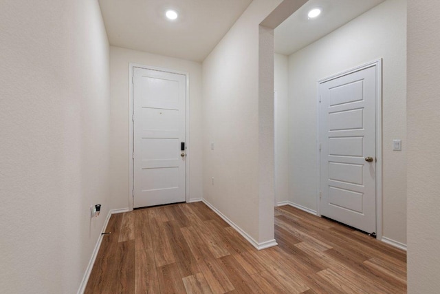 4805 Cressal Dr, Pflugerville, TX 78653 - hall with light wood-type flooring, baseboards, and recessed lighting