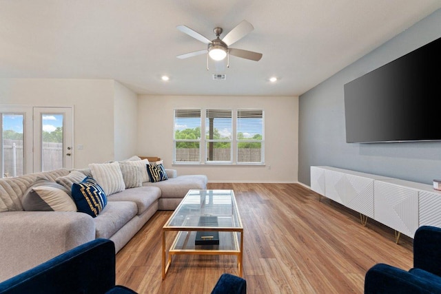 4805 Cressal Dr, Pflugerville, TX 78653 - living room featuring light wood-style floors, a ceiling fan, baseboards, and recessed lighting