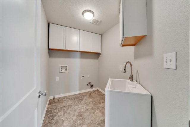 laundry room featuring gas dryer hookup, hookup for a washing machine, hookup for an electric dryer, visible vents, and cabinet space