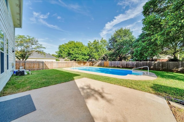 view of pool with a yard, a patio, a fenced backyard, and a fenced in pool