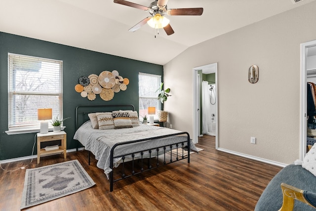 bedroom with lofted ceiling, ceiling fan, baseboards, and wood finished floors