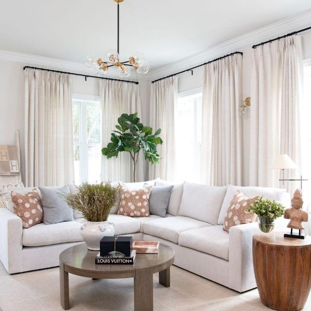 living area with crown molding