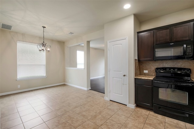 kitchen featuring tasteful backsplash, visible vents, dark brown cabinets, baseboards, and black appliances