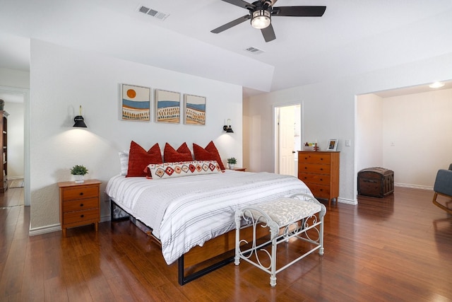 bedroom with hardwood / wood-style flooring, baseboards, and visible vents