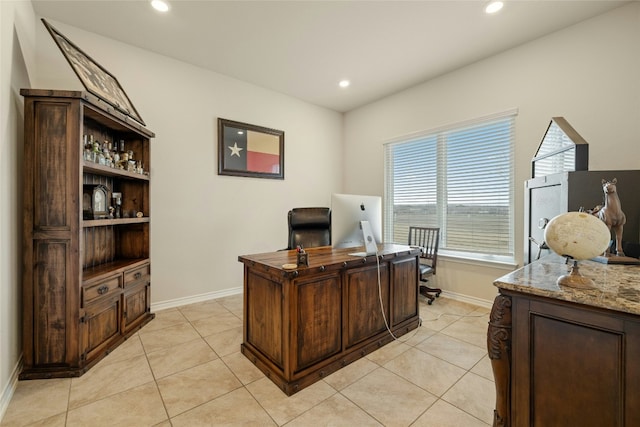 office featuring light tile patterned floors, baseboards, and recessed lighting