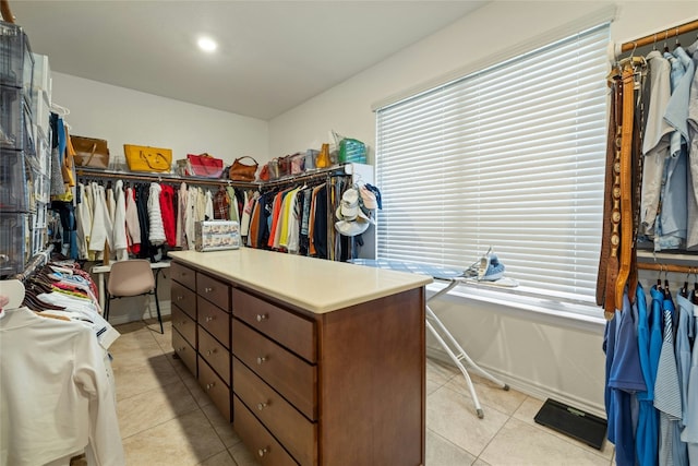 walk in closet featuring light tile patterned floors