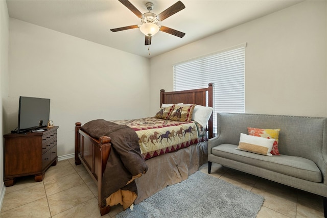 bedroom with light tile patterned floors and ceiling fan