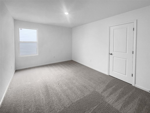 128 Gauntlet Dr, Jarrell, TX 76537 - carpeted empty room with baseboards and recessed lighting