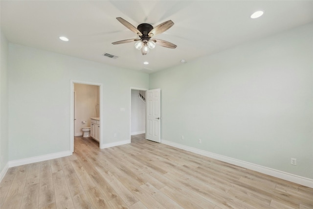 unfurnished bedroom with recessed lighting, light wood-type flooring, visible vents, and baseboards