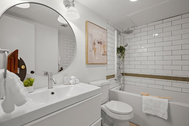 full bathroom with toilet, bathing tub / shower combination, visible vents, and vanity