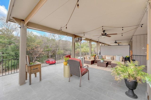 view of patio / terrace with a ceiling fan and an outdoor hangout area