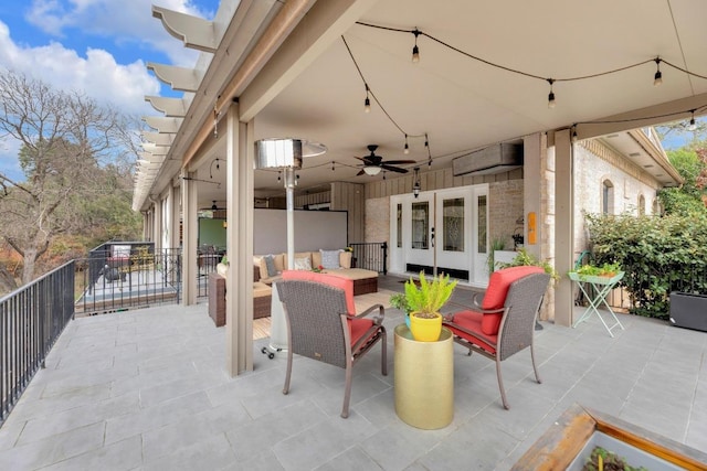 view of patio / terrace with a ceiling fan, french doors, and outdoor lounge area